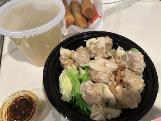 Order of fried egg rolls (3) and shrimp/pork wonton on chicken broth (to-go order).