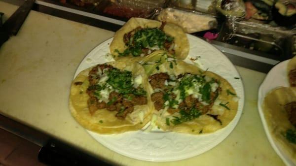 Tacos unic in town with home made salsa rojo and verde