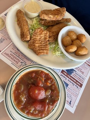 Chicken fingers with stewed tomatoes, and corn fritters