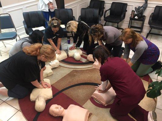 The Practice staff members receiving their CPR Certifications.