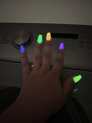 The nails glowing in the dark.