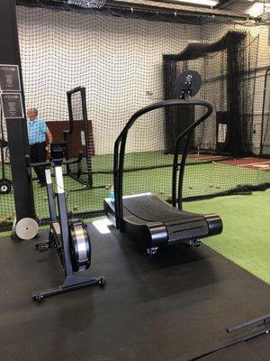 Professional curved treadmill used in major leagues along with a state of the art bike machine