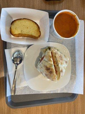 Chicken pesto with tomato soup and garlic bread.