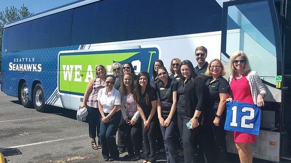 The Seahawks bus stopped by our parking lot!