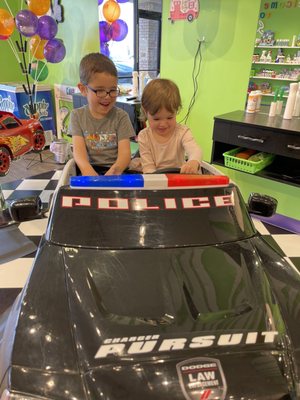 Kids playing in the cars