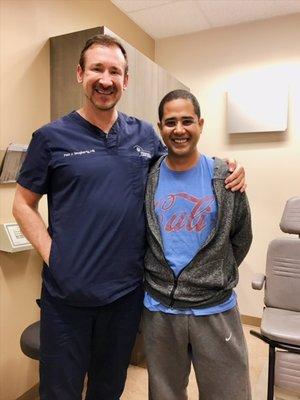 Dr. Dougherty with our SMILE patient. Check out his surgery on our Facebook.