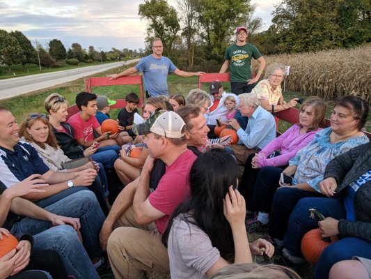 Getting together outside of worship for fun at a pumpkin farm.