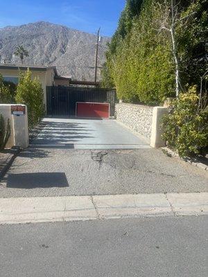 Removing broken asphalt for 2 driveway entrances and going the GreenScape Solution way by adding Pavers.