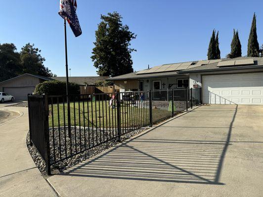 Wrought iron fencing with wood section