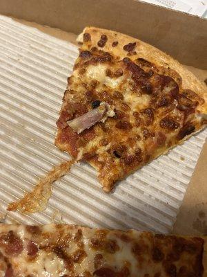 I spent $60 for 2 large pizzas and wings and I found a bone in my pizza very disappointed @pizzahut