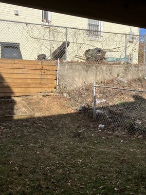 Fence before repair, falling apart in places