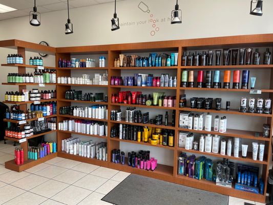 The shelves with products available for purchase at a Hair Cuttery Salon.