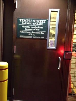 After hours, when this door is closed, you can see the $25 lockout fee notice... But not when you're driving into the parking garage.