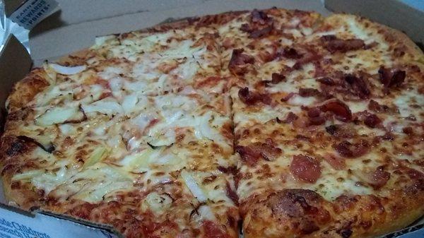 Half onion (for me) half bacon (for him). Large pie. $12 including delivery and tip. Not bad at all.