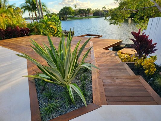 Deck, landscaping with a furmidable view.