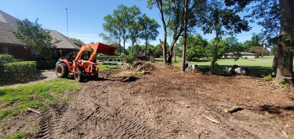 This was a over grown back yard that we cleared and Stump Grinded