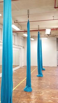 Aerial Essentials rigged this studio for Abby Lee Miller, of Dance Mom's.
 Notice the rigging plates/complete silks setup with aqua fabric.