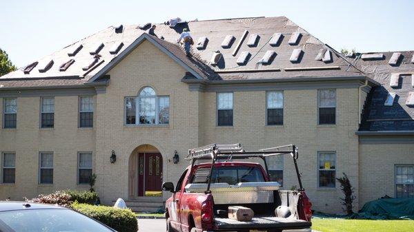 We then apply an ice guard (rubber membrane) to the lower perimeter of the roof and in valleys to ensure no ice backup leakage.