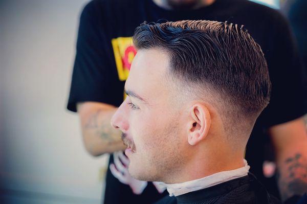 Classic haircut with a nice tapered look.