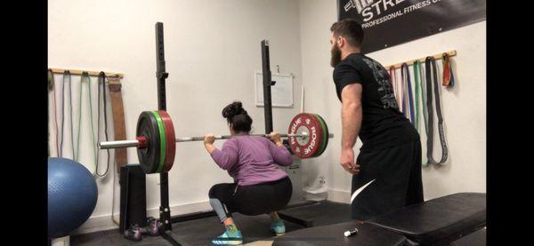 My most recent 2 rep max (230 lbs) on the squat in December 2018.