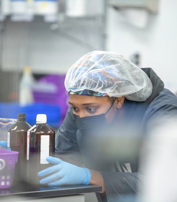 Compounding technician working at Chemistry Rx.