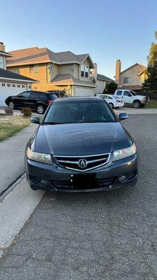 Before repair- front bumper sagging, headlights looks awful, missing piece of my grille, Fender liners were formed up, and chipped fog light