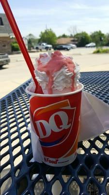 Cotton Candy blizzard with whipped cream and cotton candy drizzle on top. Is this real life?