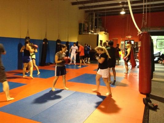 Auburn MMA fitness kickboxing....students getting in shape while learning self defense