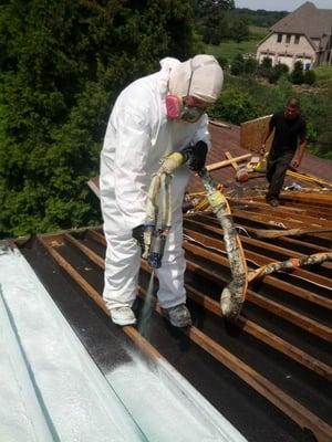 Closed cell spray foam insulation added from the exterior of a new roof project.  