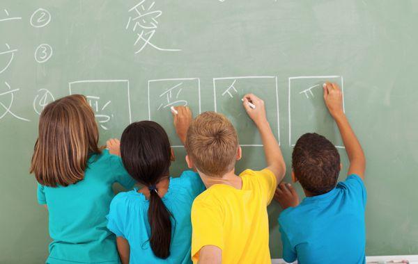 Children learning and writing Mandarin Chinese in Washington, DC.