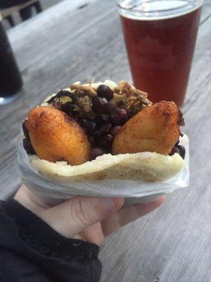 Shredded beef, fried plantains and back bean arepa!! Yum!