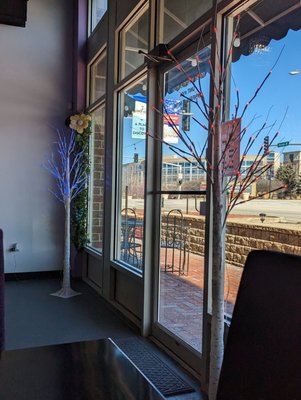 Front door with purple light decor