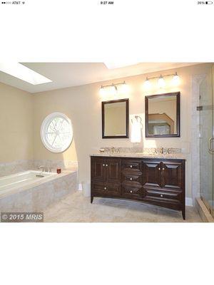 Using a furniture style cabinet transformed this Great Falls bathroom