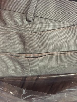 These are the "redone" hems on BRAND NEW pants! What are the stains?? Who knows..