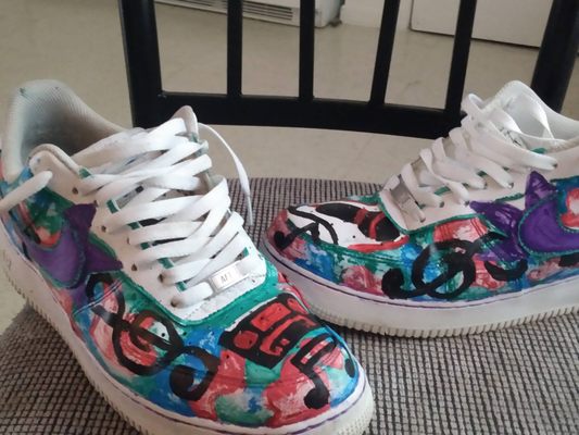 Air Force 1 hand painted red, blue and green camo with purple check and border line   music notes , cassette and mic included on toes .