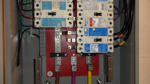 480V electrical panel, replaced hardware and damaged circuit breaker.