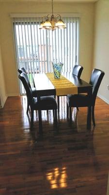 Dining room leading to a private balcony