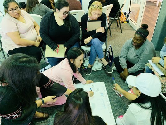 Teachers and staff learn importance of roles and boundaries during Dr. Trevicia Williams' effective communication seminar.