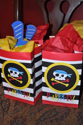 even made the goody bags.. swords, eye patches, pirates loot, and pirates booty snacks