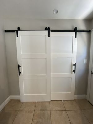 He came back to install barn doors when they arrived.