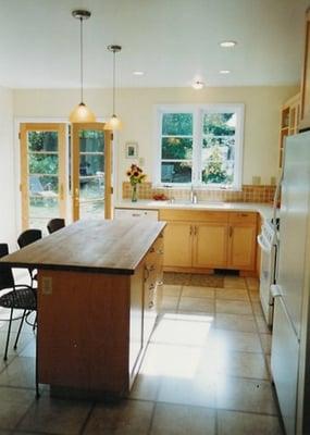 Former small out-dated, dark kitchen reimagined into a spacious, light-filled dream!