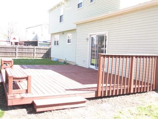 Pressure treated deck stained with Cabot mission brown.