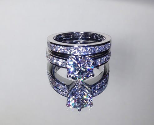 We can create custom-made diamond engagement rings and wedding band sets. Just ask!