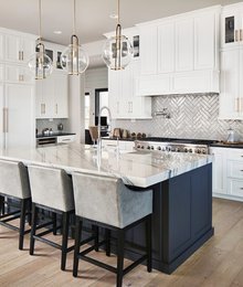 Beautiful Kitchen white uppers cabinets and dark Blue Island.