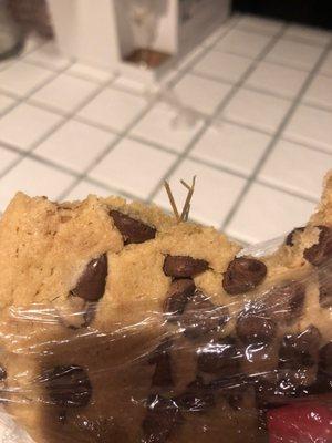 Chocolate chip cookie with sticks in the middle