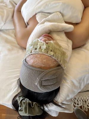 Relax with hot stones, Jade eye mask, essential oils and hot neck towels.