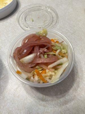 A small serving of coleslaw