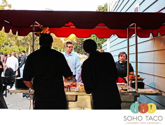 Taco catering during a wedding in the courtyard of the OC Sailing & Events Center.