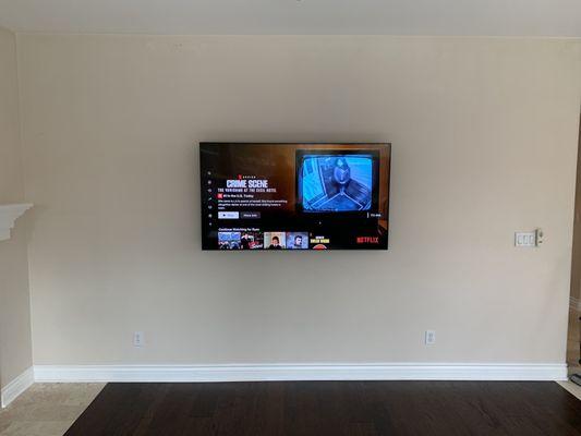 Markus installed an outlet behind the tv so that there aren't any exposed cables or wires