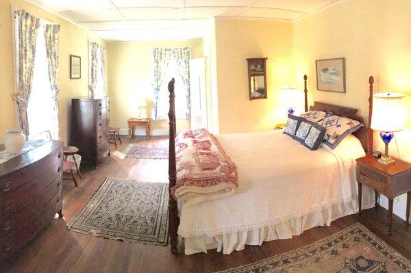 Bright and sunny, the Fitch Room features a queen-size four-poster bed, private bathroom, wifi, television, and a desk.